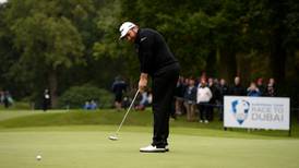 Shane Lowry battles to remain in contention at British Masters