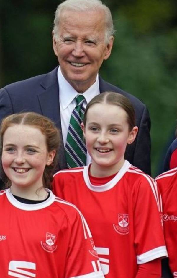 Eleven-year-old Lucy Bourke (on the right) with US president Joe Biden. Photograph: Supplied by Lucy's father Willie Bourke