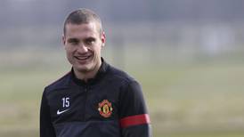 United captain Vidic looking forward to arrival of Moyes