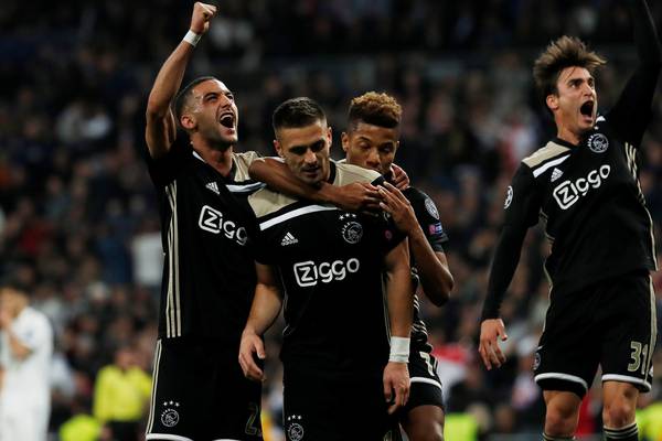 Ajax storm Bernabeu to send champions Real Madrid crashing out