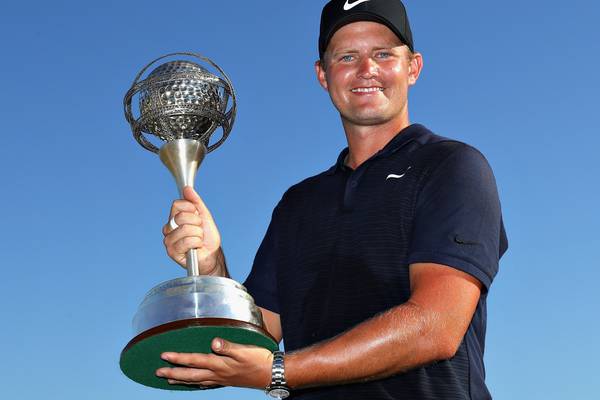Tom Lewis victorious in Portugal despite wet ending