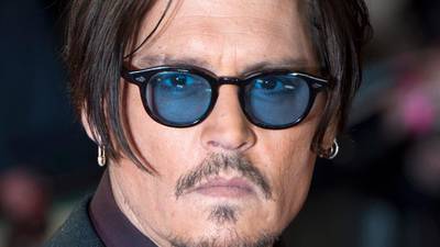 Actor Johnny Depp flies dogs out of Australia