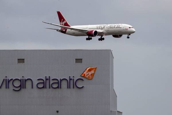 Virgin Atlantic and United cut jobs, while Qantas raises millions as Covid-19 bites