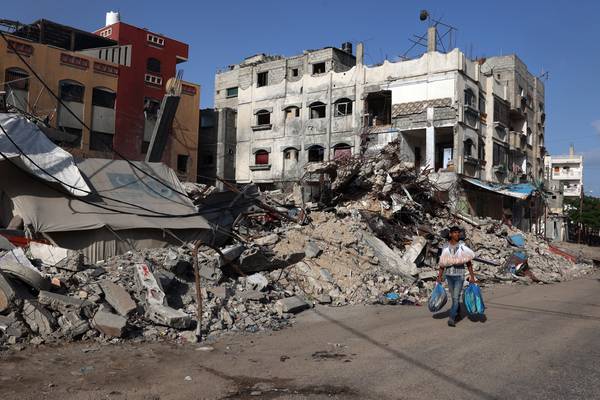 Gaza: At least 20 killed after Israeli air strikes on camp for displaced people in Rafah