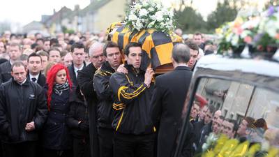 Sons of murdered GAA player James Hughes to share €90,000