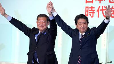 Abe re-elected as party leader paving way to become longest serving PM