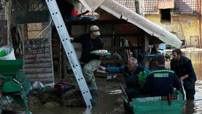 Death toll climbs as floods surge on through central Europe