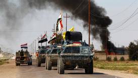 Iraqi forces await reinforcements before renewing Tikrit offensive