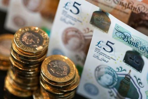 Sterling sinks to 3-week low on economy, Tory conference
