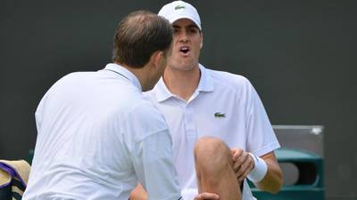 Wimbledon officials deny courts are to blame for injuries