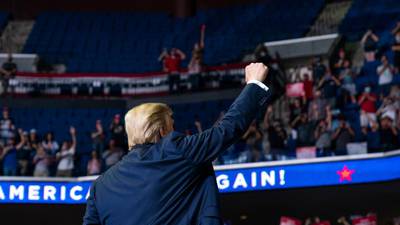 Trump returns to campaign trail with many empty seats at Tulsa