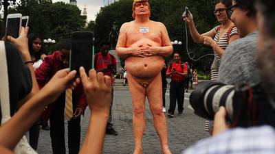 Why are statues of naked Donald Trump appearing across US?