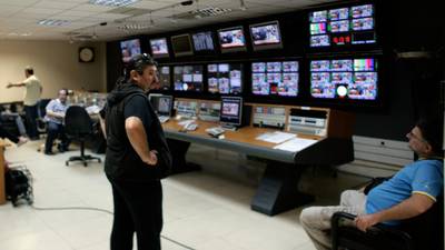 Staff at Greek state broadcaster continue service despite closure