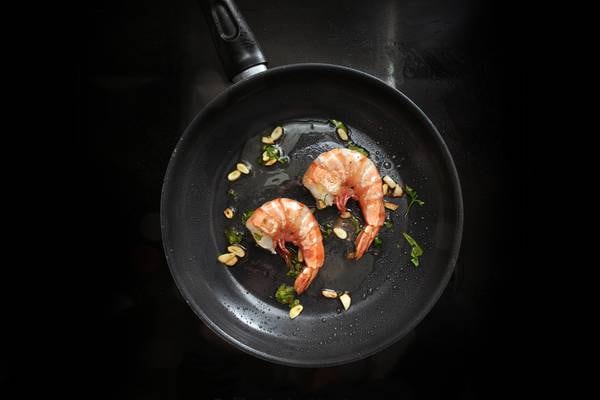 The tyranny of small-plate dining: what’s the best way to split these two prawns five ways?