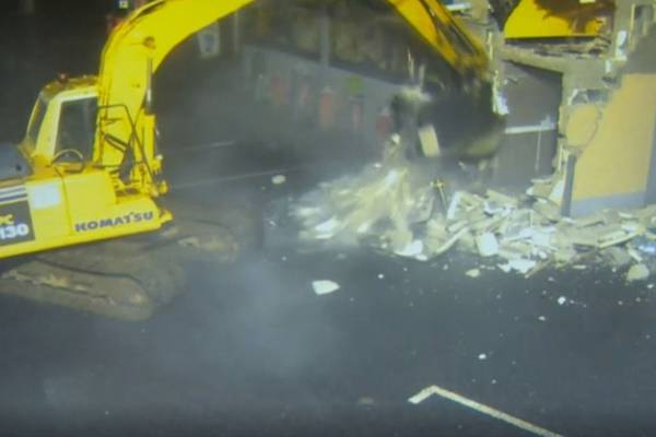 CCTV shows ATM being ripped from wall with stolen digger