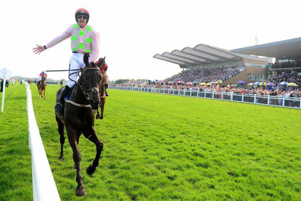 Burrows Saint delivers Irish Grand National glory in style for Mullins at last