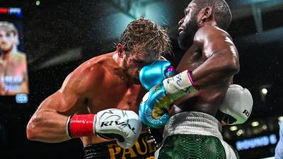 Logan Paul v Floyd Mayweather fight ends in boos as each fighter makes millions