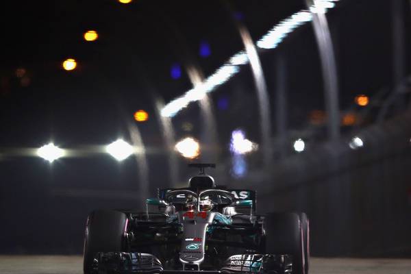 Lewis Hamilton shoots the lights out to take pole in Singapore