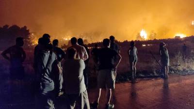 Dozens evacuated from island as Greece battles wildfires
