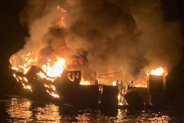Search for bodies continues after boat fire kills at least 25