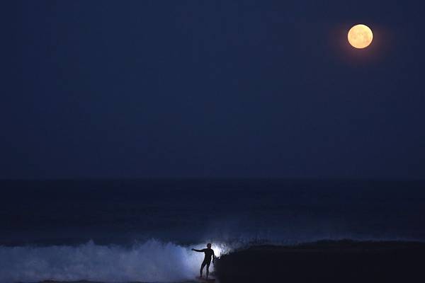Irish among San Diego surfers catching waves beneath the stars