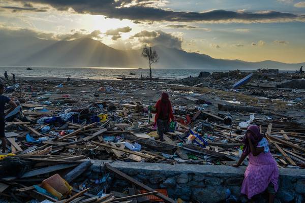 Indonesia tsunami: Bodies of mother clutching baby found