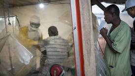An Ebola crisis spread by violence and suspicion