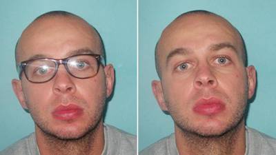 Police in Britain hunt robber released in error from prison