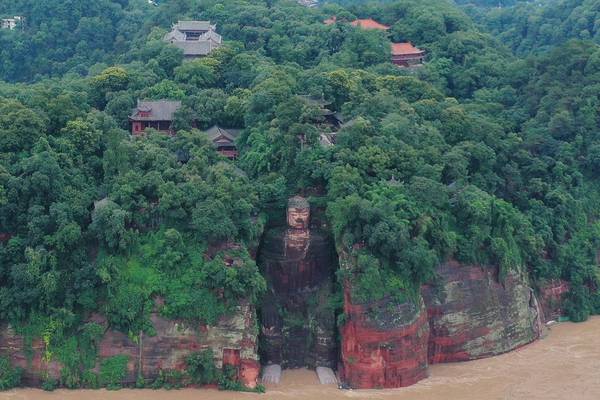 Floodwaters in China creep over giant Buddha’s toes for first time in 70 years