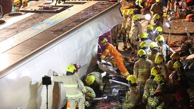 At least 18 dead and dozens hurt in Hong Kong bus crash
