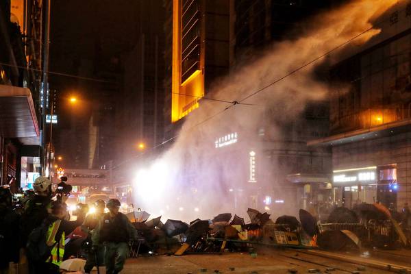 Tear gas fired at New Year’s Day protesters in Hong Kong