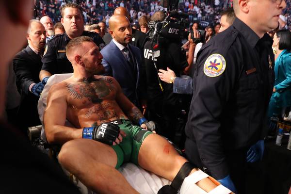 Conor McGregor suffers broken leg in first round defeat to Dustin Poirier