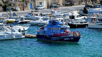 Girl (2) dies and eight others missing after boat sinks off Lampedusa in Italy
