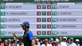 Rory McIlroy leads British Open  by one after a 66