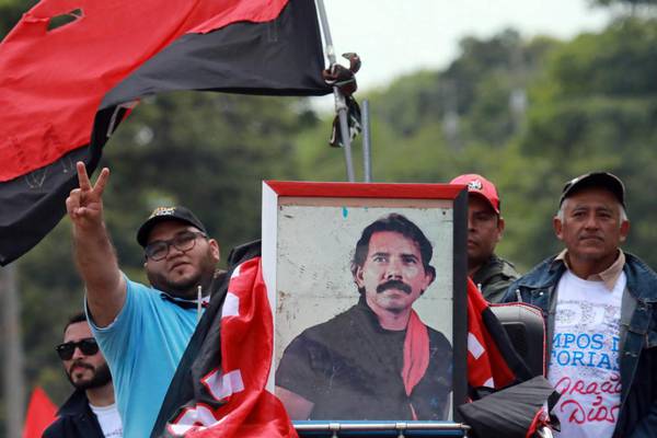 ‘God put him there’: Nicaragua’s defiant leader clings to power