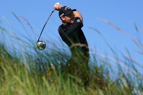 Strong home challenge mounted early on at British Open