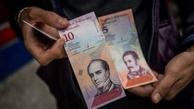 Venezuela’s currency devaluation spreads confusion and closes shops