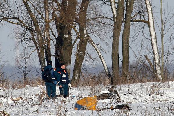 Russian investigators search for clues after fatal plane crash
