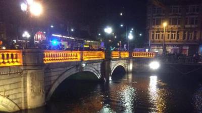 Emergency services rescue man from River Liffey in Dublin