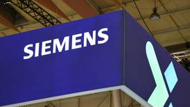 Siemens expects rising returns on bulging order books