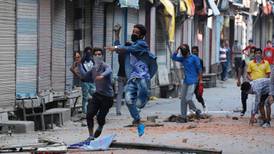 At least 22 killed in protests over Kashmir leader’s death