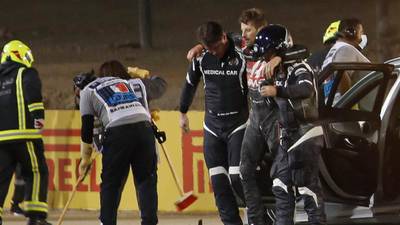 Car sliced in half but Grosjean survives huge crash at Bahrain Grand Prix