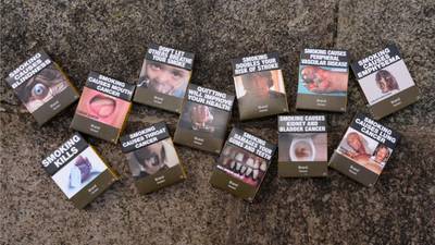 Australia wins court challenge to tobacco plain packaging