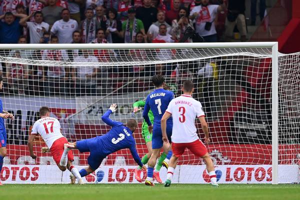 Poland strike late to earn point against England after fraught encounter