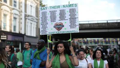 Silent procession marks first anniversary of Grenfell Tower blaze which claimed lives of 72 people