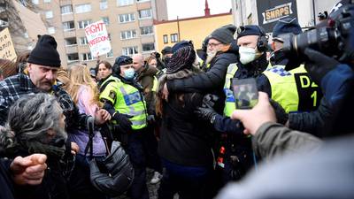 Covid-19: Police break up restrictions protest in Stockholm
