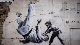 Banksy showcases new mural in Ukrainian town