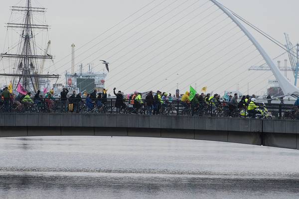 Dublin cyclists protest against car pollution and lack of infrastructure