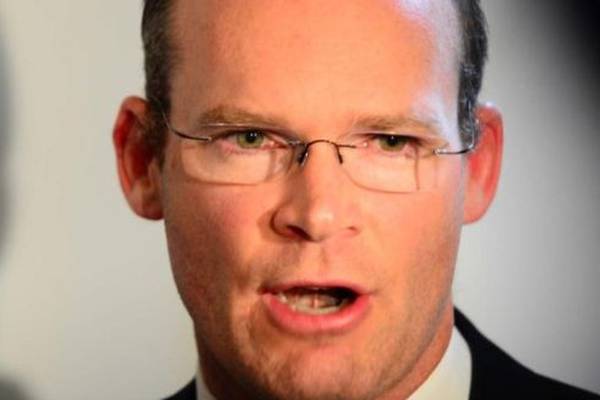 Coveney asks Apollo House occupants to work with State