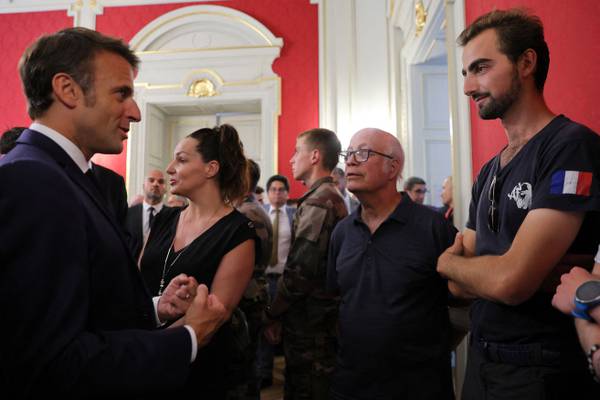 Macron visits victims of Annecy knife attack and meets man who attempted to stop assailant